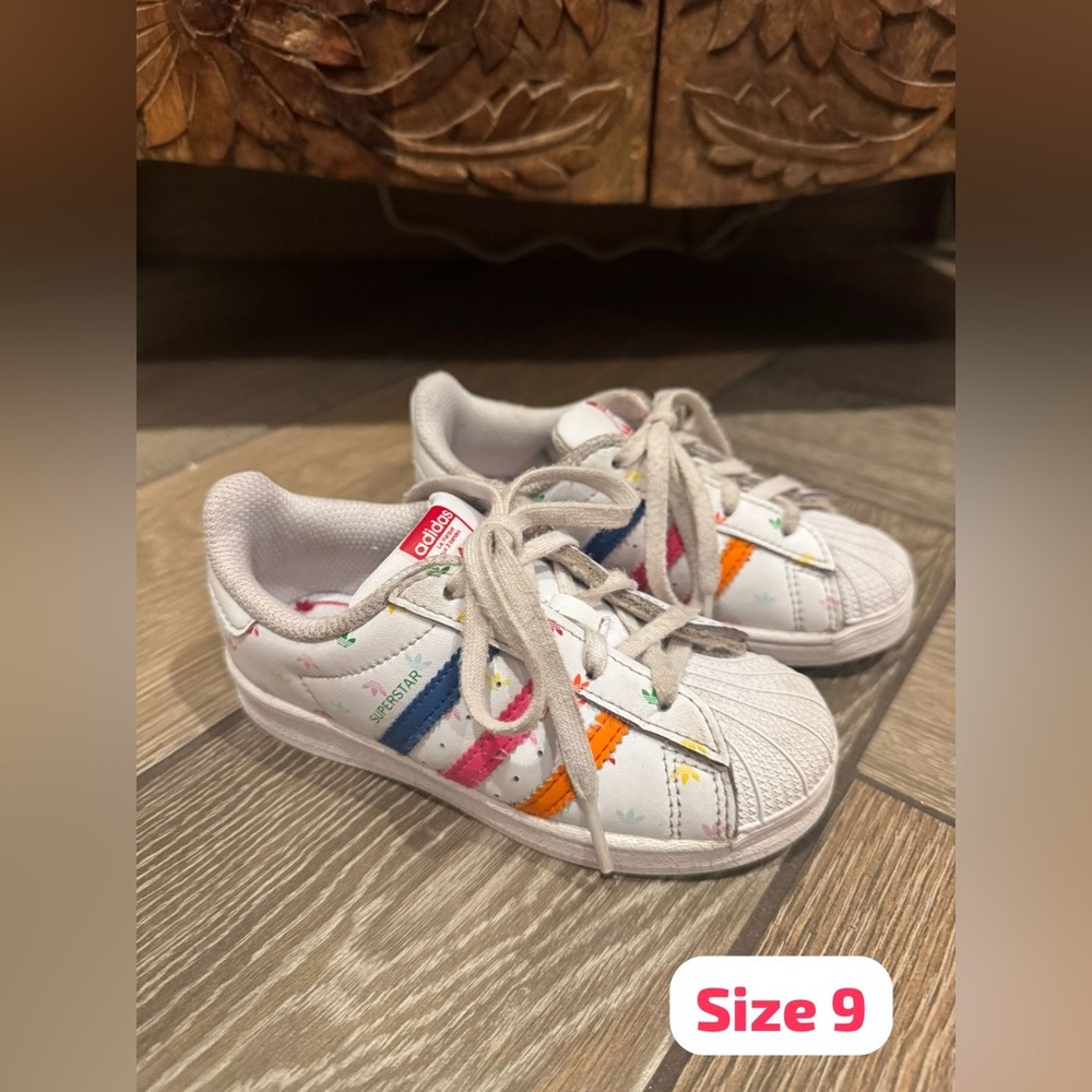 Adidas Kids Sneakers with White, Blue, and Orange Stripes